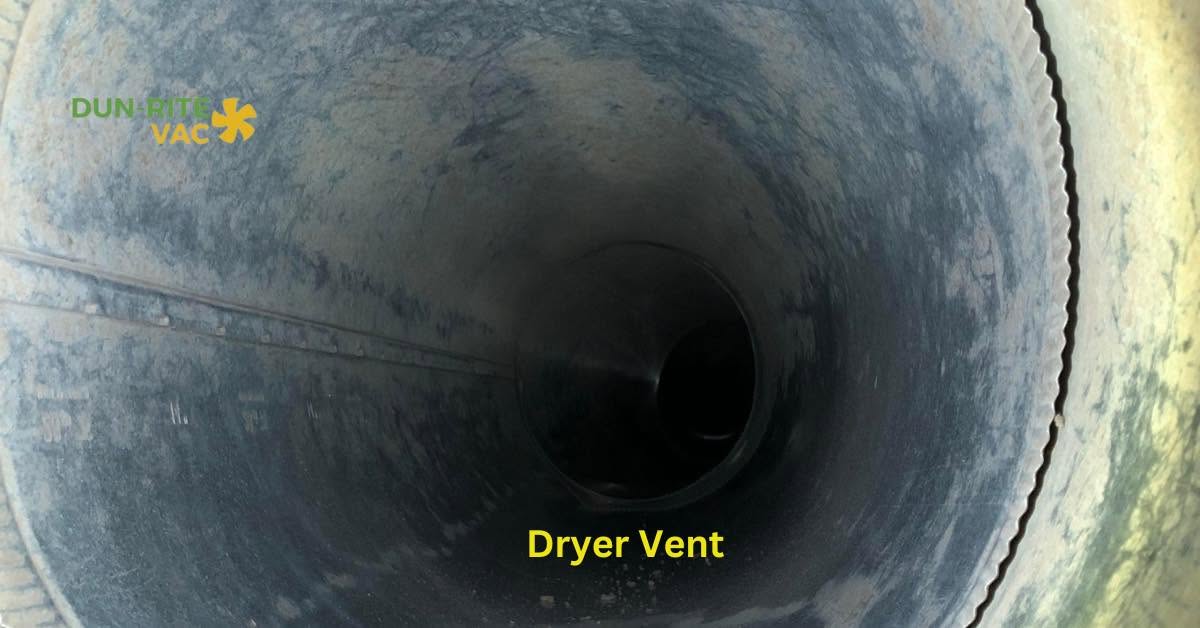 Interior view down a dryer vent duct showing a clean lining