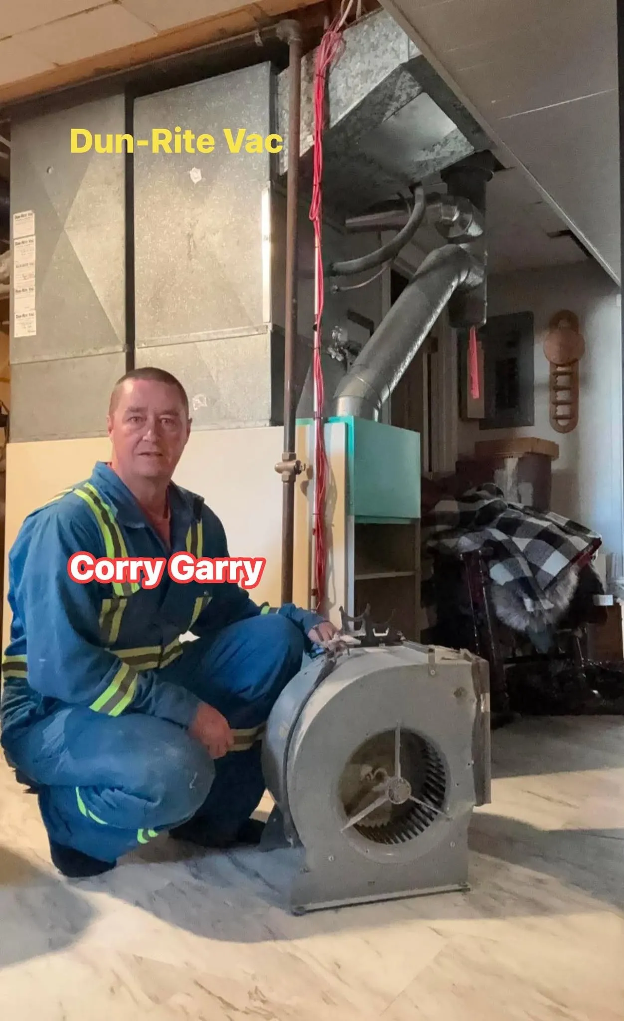 Technician inspecting a furnace to determine how often air duct cleaning is needed.